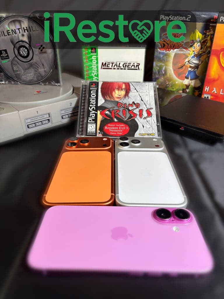 iPhones laid out in front of a PlayStation console and classic PlayStation games, under the iRestore wordmark